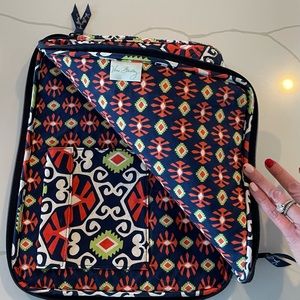 Vera Bradley Laptop Case. One velcro interior pocket. Machine wash.